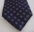 Liberty of London navy tie with red geometric circle dot pattern