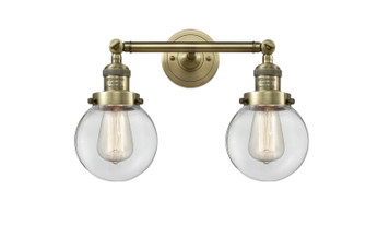 Franklin Restoration Two Light Bath Vanity in Antique Brass (405|208-AB-G202-6)