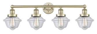 Edison Four Light Bath Vanity in Antique Brass (405|616-4W-AB-G532)