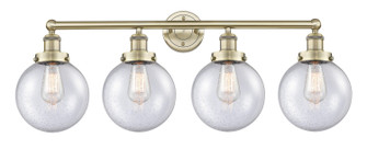 Edison Four Light Bath Vanity in Antique Brass (405|616-4W-AB-G204-8)