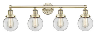 Edison Four Light Bath Vanity in Antique Brass (405|616-4W-AB-G202-6)