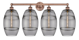 Edison Four Light Bath Vanity in Antique Copper (405|616-4W-AC-G557-8SM)