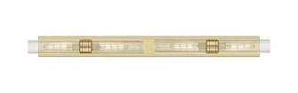 Downtown Urban Four Light Bath Vanity in Antique Brass (405|617L-4W-AB-G617-11SCL)