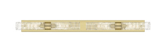 Downtown Urban Four Light Bath Vanity in Antique Brass (405|617L-4W-AB-G617-11DE)