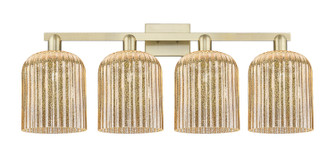 Arcadia Four Light Bath Vanity in Antique Brass (405|716-4W-AB-G559-8ME)