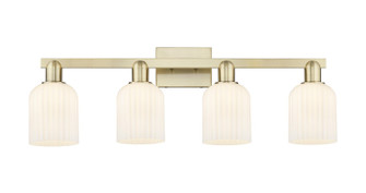 Arcadia Four Light Bath Vanity in Antique Brass (405|716-4W-AB-G559-5GWH)