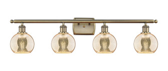Ballston Four Light Bath Vanity in Antique Brass (405|516-4W-AB-G128-6)