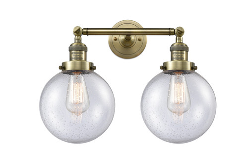 Franklin Restoration Two Light Bath Vanity in Antique Brass (405|208-AB-G204-8)