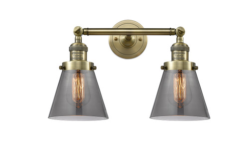 Franklin Restoration Two Light Bath Vanity in Antique Brass (405|208-AB-G63)