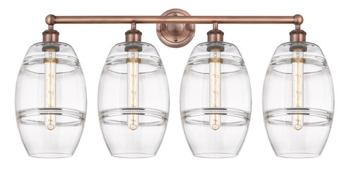 Edison Four Light Bath Vanity in Antique Copper (405|616-4W-AC-G557-8CL)