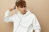 Why Do Rappers and Singers Wear Hoodies and Sweatpants?