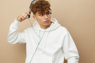 Why Do Rappers and Singers Wear Hoodies and Sweatpants?