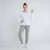 Just Sweatshirts White French Terry Scoop Neck ladies sweatshirt on a female model, showcasing casual outfit style.