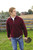 Just Sweatshirts Burgundy Zip Neck Ring Spun Cotton Sweatshirt, quarter-zip design, 100% cotton, on a man.