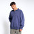 Just Sweatshirts 3 Button Polo Navy Sand 100% Cotton polo shirt on a male model in blue color.