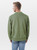 Just Sweatshirts Olive green 3 Button Polo made from 100% cotton, displayed on a male model.