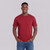 Just Sweatshirts T-Shirt Short Sleeve 100% Cotton Ruby Red, worn by a smiling man in blue jeans.