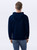 Just Sweatshirts Hooded Pullover Navy 100% Cotton, dark navy blue, long sleeve, athletic hood sweatshirt on a model.