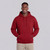 Just Sweatshirts Ruby Red hooded pullover, 100% cotton, no  hoody, worn by a smiling young man.