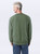 Olive green crewneck sweatshirt by Just Sweatshirts made of 100% cotton, displayed on a male model.