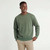 Just Sweatshirts olive green Crewneck Sweatshirt, 100% Cotton, on a young smiling dark man.