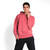 Just Sweatshirts Red Sand hooded pullover hoodie, 100% cotton, vibrant pink color on a male model standing.