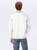 Just Sweatshirts White all cotton sweatshirt on man, crewneck, 100% cotton, roomy fit, from back view.