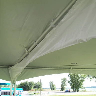 15' Water Gutter for Pinnacle, close-up view showing the gutter installed under the tent canopy with a white fabric exterior and gray plastic piping.