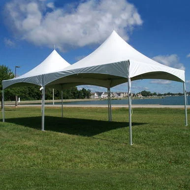 20' Water Gutter for Pinnacle, white outdoor water gutter tent set up on grassy field with lake and blue sky in the background