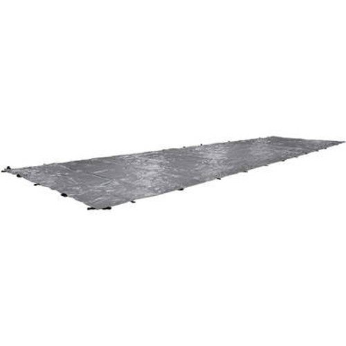 45\'x54\' hay tarp laid flat, unfolded, silver side facing up. 45\'x54\' hay tarp laid flat, unfolded, silver side facing up.