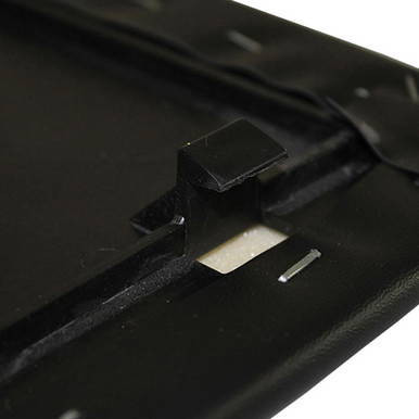 Black Oxford Chair Pad, close-up image showing the black material and adjustable strap for securing the pad to a chair.