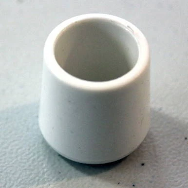 White Replacement Chair Feet, close-up view of a smooth, cylindrical white plastic chair leg cap.