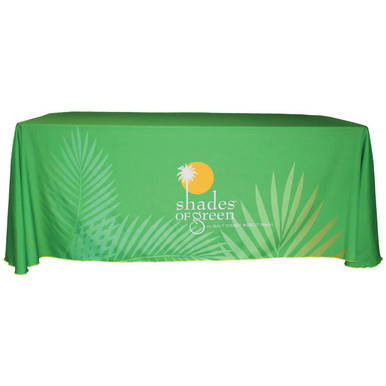 6' Draped Full Dye-Sublimation Table Cover, green fabric with leaf and palm tree patterns and a 'shades of green' logo.
