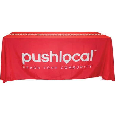 6' Draped Full Dye-Sublimation Table Cover, red fabric with white pushlocal logo and slogan printed on it.
