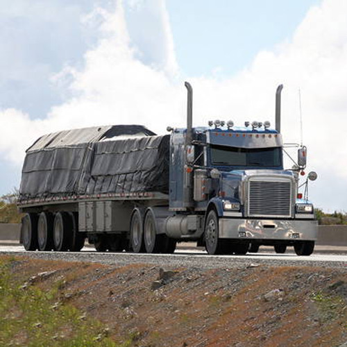 Lumber tarp on semi trailer. Lumber tarp on semi trailer.
