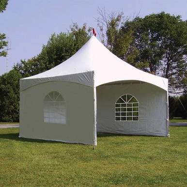 Celina Tent 15' x 15' Pinnacle Series High Peak Frame Tent / Cross Cable Marquee, complete setup on a grassy field with trees in the background, showcasing a durable white event tent with high peak design and multiple window panels.