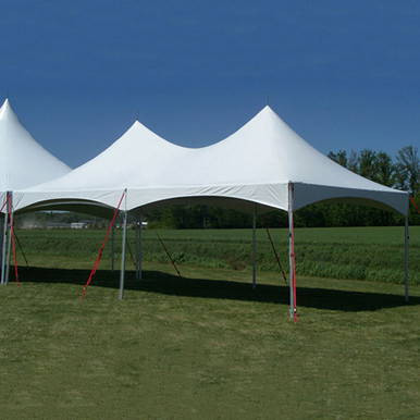 Celina Tent 15' x 30' Pinnacle Series High Peak Frame Tent / Cross Cable Marquee, complete outdoor event tent with high peak design, supported by cross cables, situated on a grassy field under a clear blue sky.
