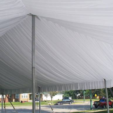 Pole Tent Liner 30' x 15' Mid, interior view showing white fabric tent liner with support poles and draped ceiling for outdoor event coverage.