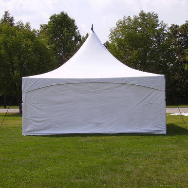Celina Tent 8' x 10' Solid Pinnacle Sidewall, white event tent with solid sidewalls set up outdoors on a grassy area with trees in the background.
