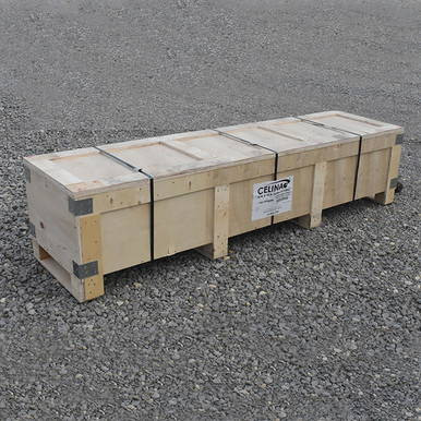 Celina Tent Humanitarian Tent 16' x 16', wooden crate with secured straps on a gravel surface.