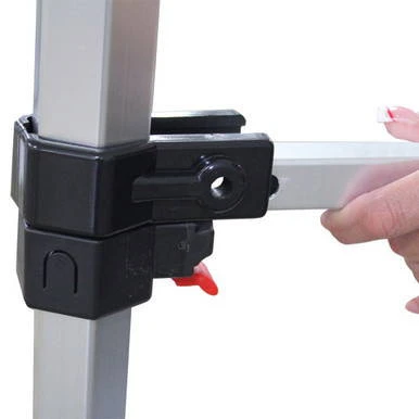 Celina Tent 10' Al. Rail Skirt Fitting, close-up image of a user attaching the rail skirt fitting to a tent frame using a plastic clip and securing it with a red latch.