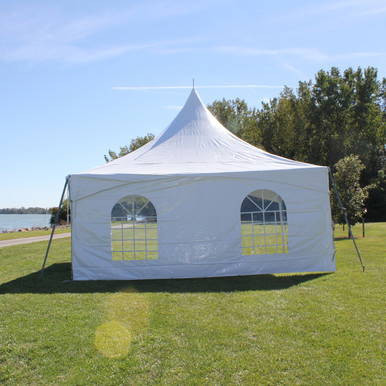 8' x 20' Window Pinnacle Wall, outdoor event tent set up on grassy field with clear blue sky and trees in background.