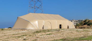Celina Tent Large Area Maintenance Shelter (LAMS), Type V (Vehicular), Bi-Lid Ends, 60Hz, with 2 20’ containers, beige fabric shelter in an outdoor setting.