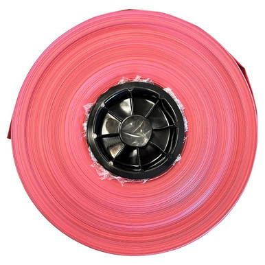 Disposable Pole Cover - Fuchsia/Pink, close-up of a roll of pink disposable pole covers with a black core