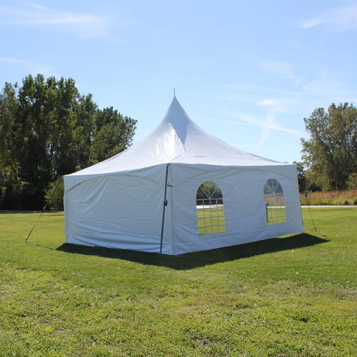 Event Rental Startup Revenue Bundle, white event tent with windows set up outdoors on green grass under blue sky.