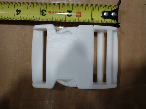 2" White Side Release Buckle, product image showing a white plastic buckle with a measuring tape indicating its size.