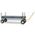 X Country Cart, a flatbed utility cart with metal construction, four wheels, and a yellow handle for manual pulling or pushing.