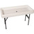 White Little Chiller Table, a rectangular white insulated table with a smooth surface and a central drain hole, supported by black metal legs.
