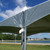 10' Water Gutter for Pinnacle, close-up view of the gutter system installed on a pavilion tent with a scenic outdoor background.