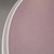 31'' Resin Cocktail Table, close-up view showing the round tabletop with a smooth, pinkish surface and a white curved edge.